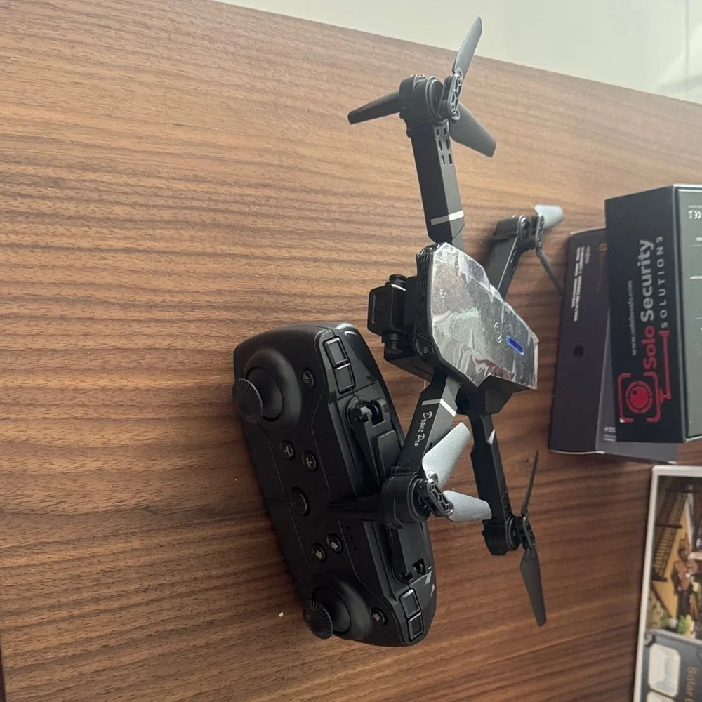 Mini wireless drone with remote control and 2 cameras can connect to smartphones